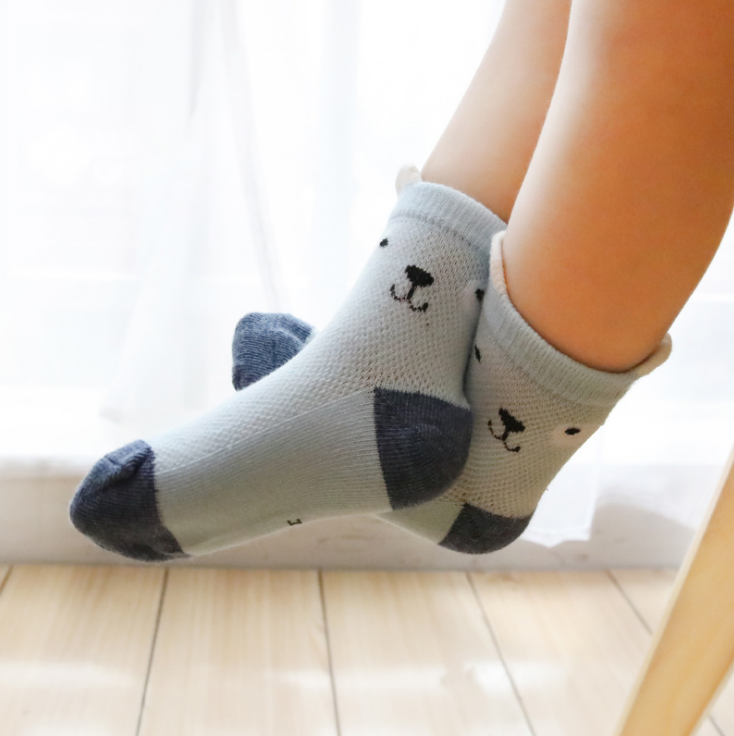 cotton socks on a child feet