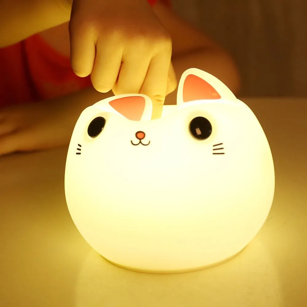 Friendly Kitty Night Light squeezed with a finger