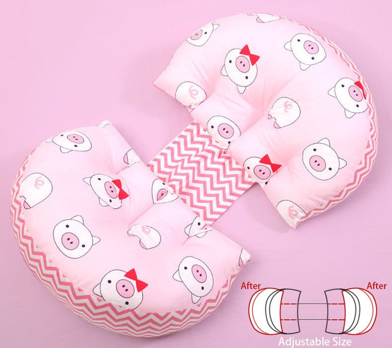pink pregnancy pillow on a pink background